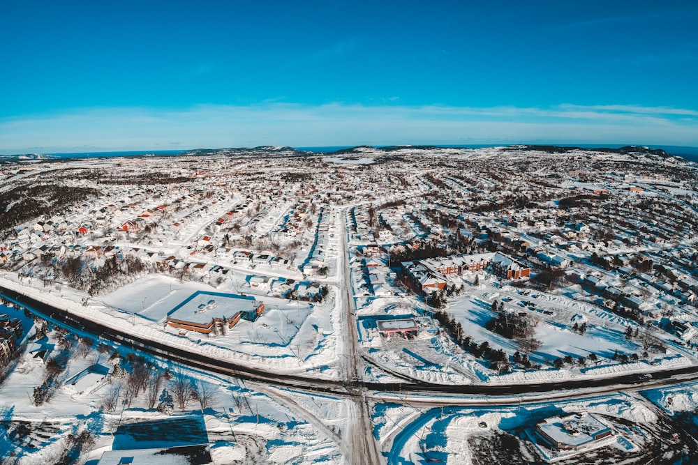 an aerial view of a city in winter