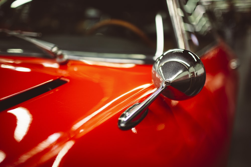 red and silver car steering wheel