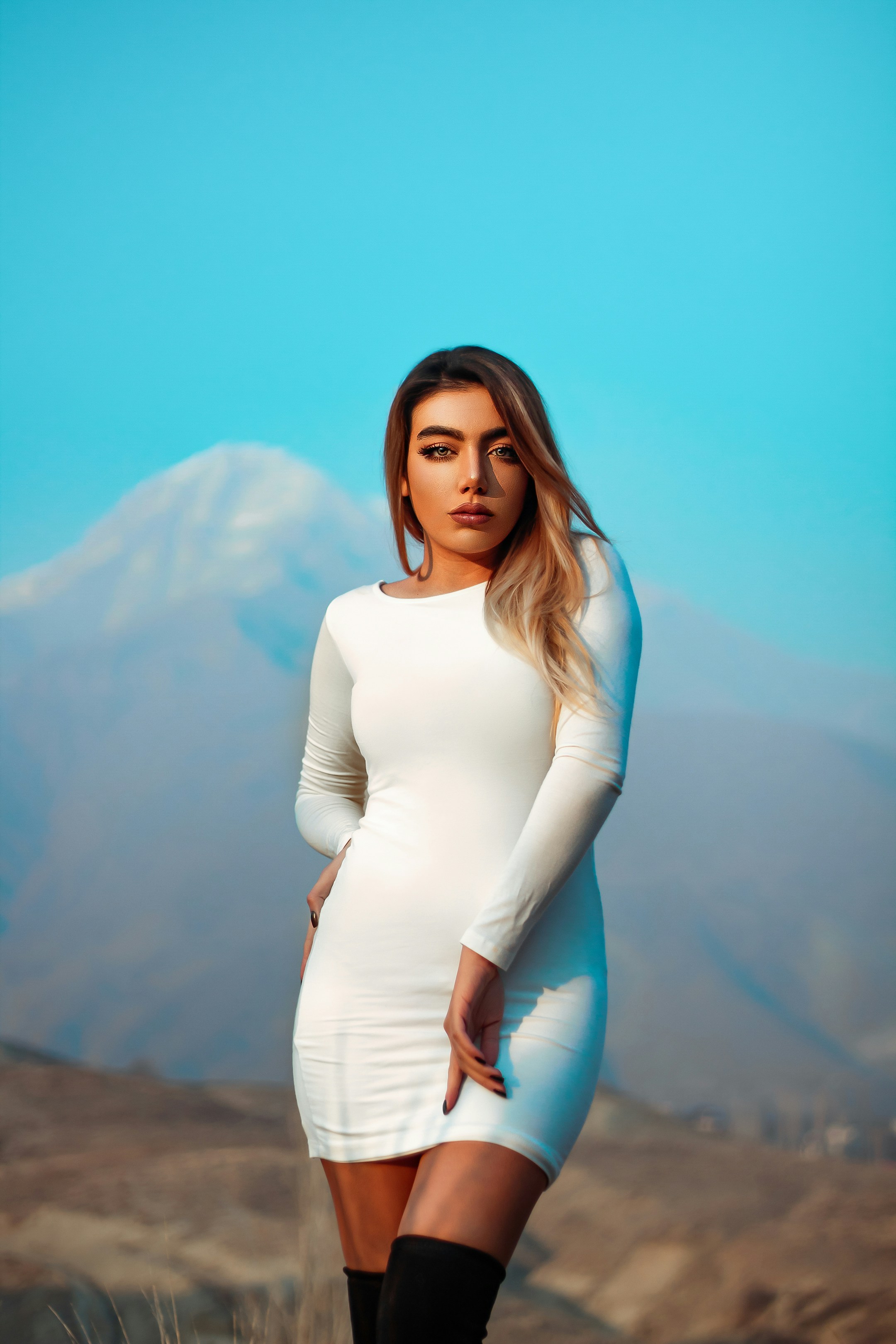 woman in white long sleeve dress