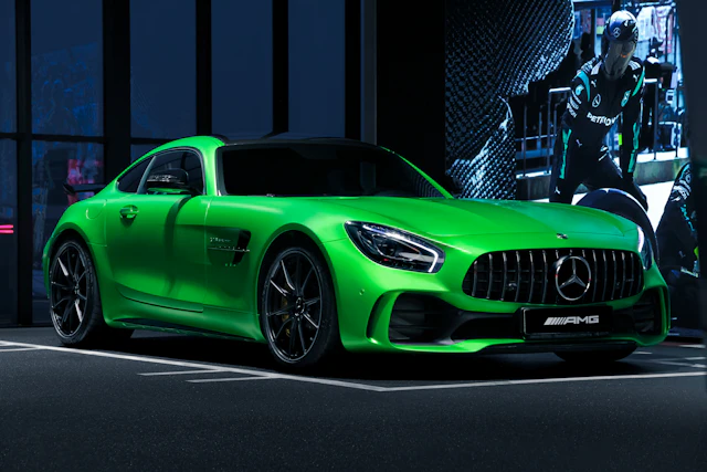 Mercedes coupe in a parking lot
