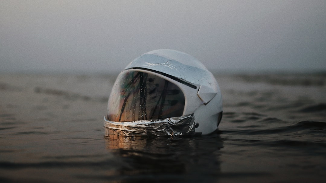 clear glass ball on water