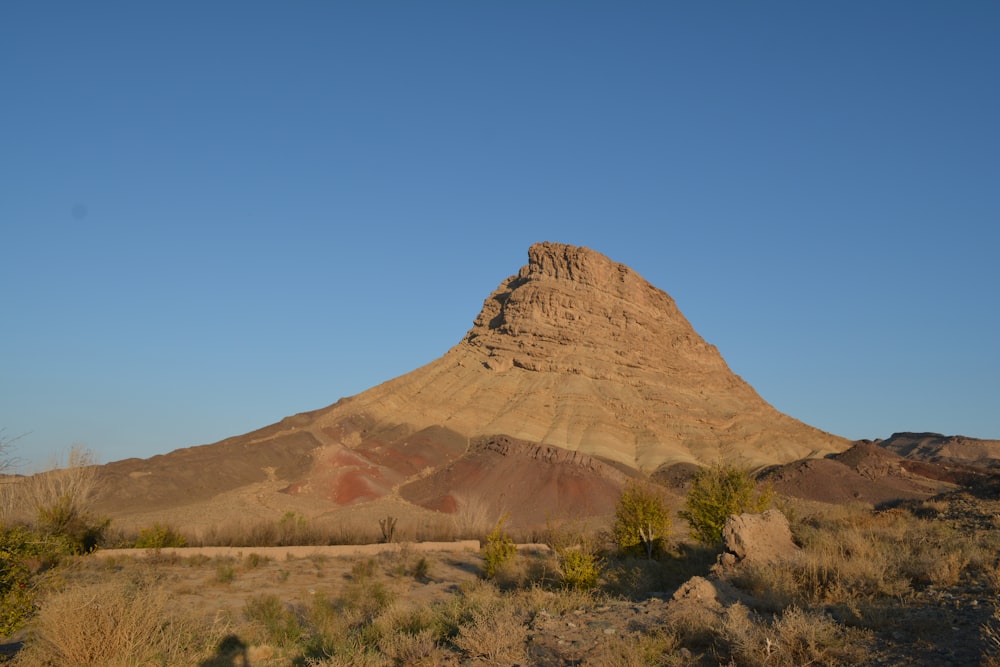 brown rock formation under blue sky during daytime