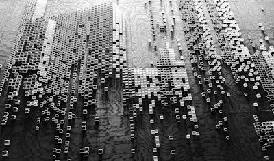 An artistic arrangement of sleek, glossy brikoria blocks forming a modern abstract sculpture.