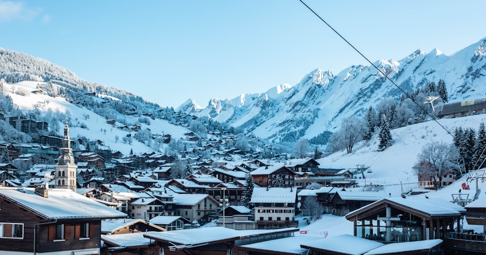 a ski resort with a mountain in the background