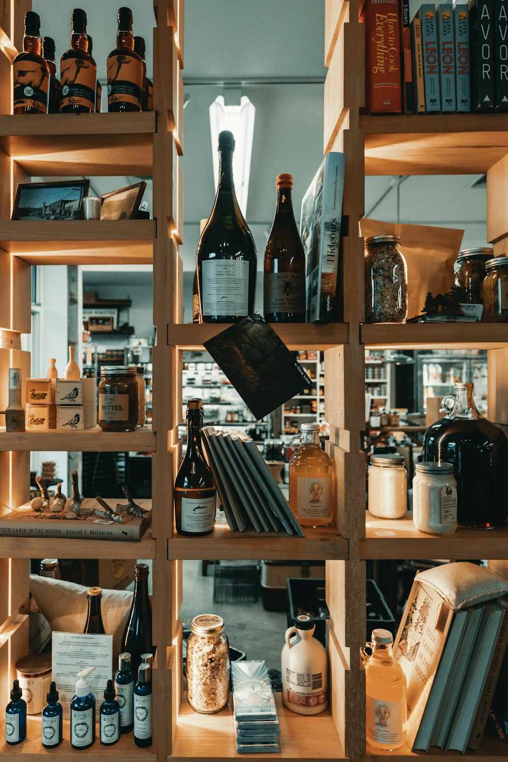 a shelf filled with lots of bottles of wine