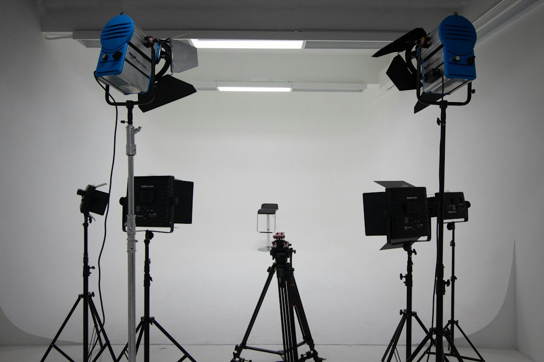 a group of lights that are on a tripod, Video Production