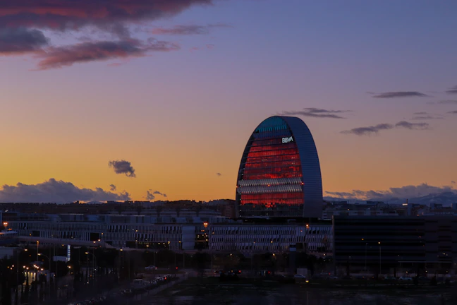 Urban cityscape at dusk showcasing minimalist design elements and clear lines.