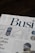 a newspaper with a picture of a man on it