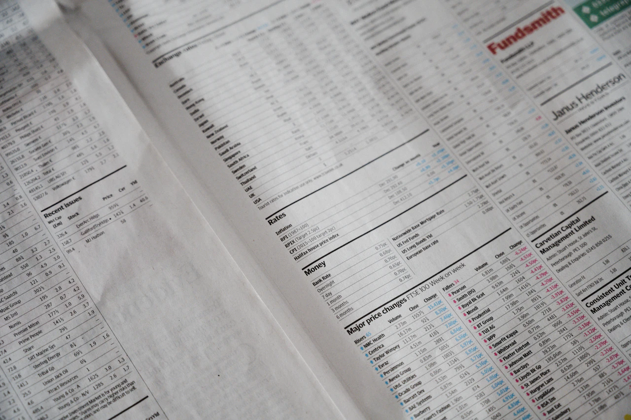 A close view of a finance page dense with figures, the raw numbers reporting software organizes into decisions