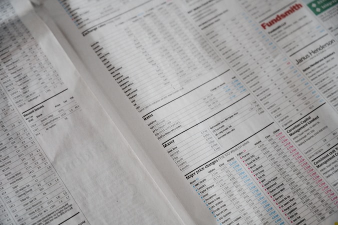 A newspaper page focused on financial information, including stock market data, recent issues, rates, major price changes, and investment fund details. Columns of numbers are interspersed with headings and small charts, printed on plain paper with a slightly off-white background.