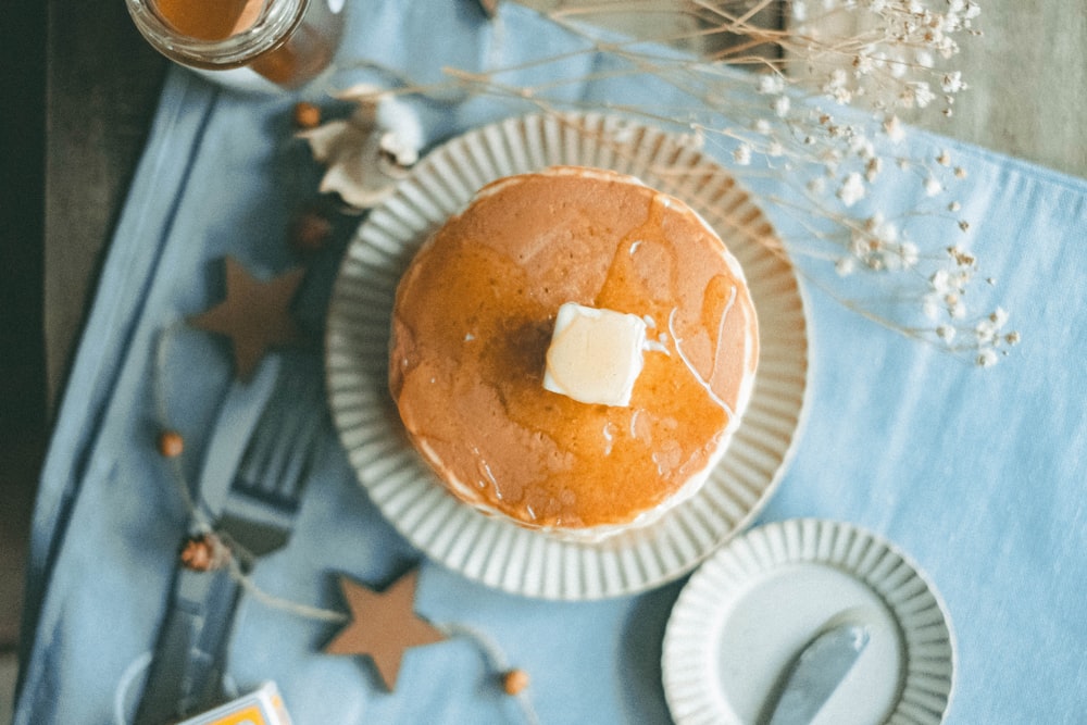 brown cupcake on white paper plate