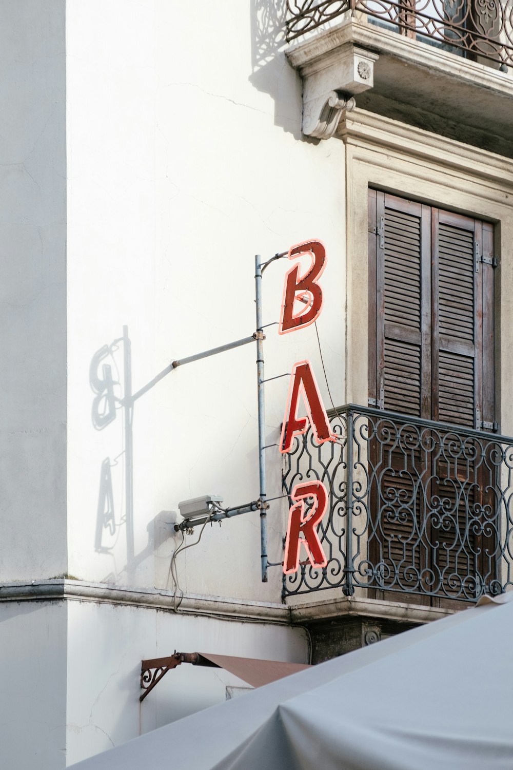 a building with a sign that says bar on it