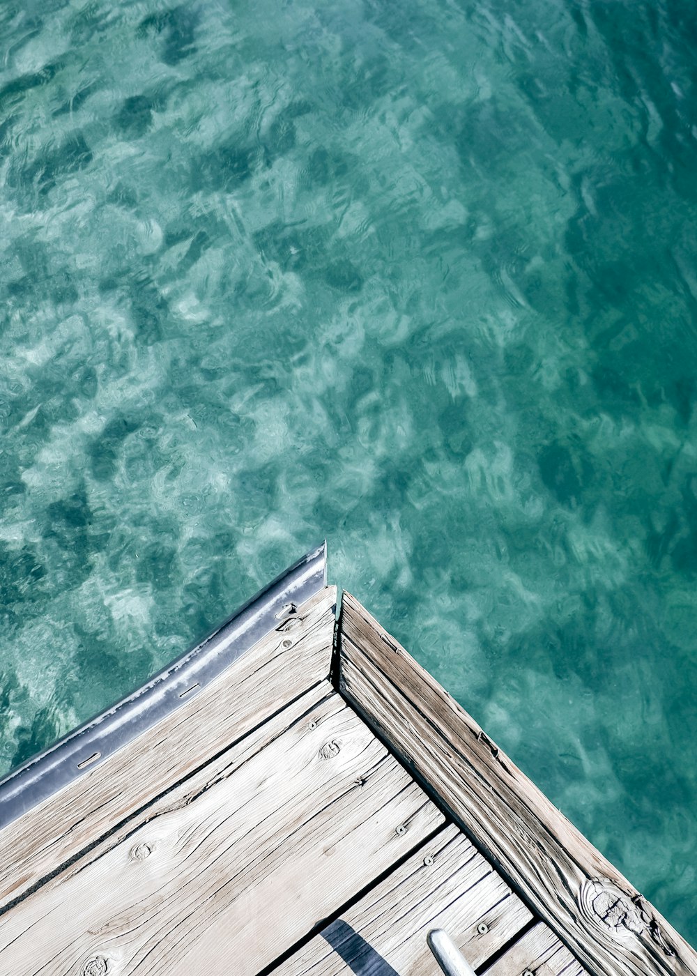 brown wooden boat on water