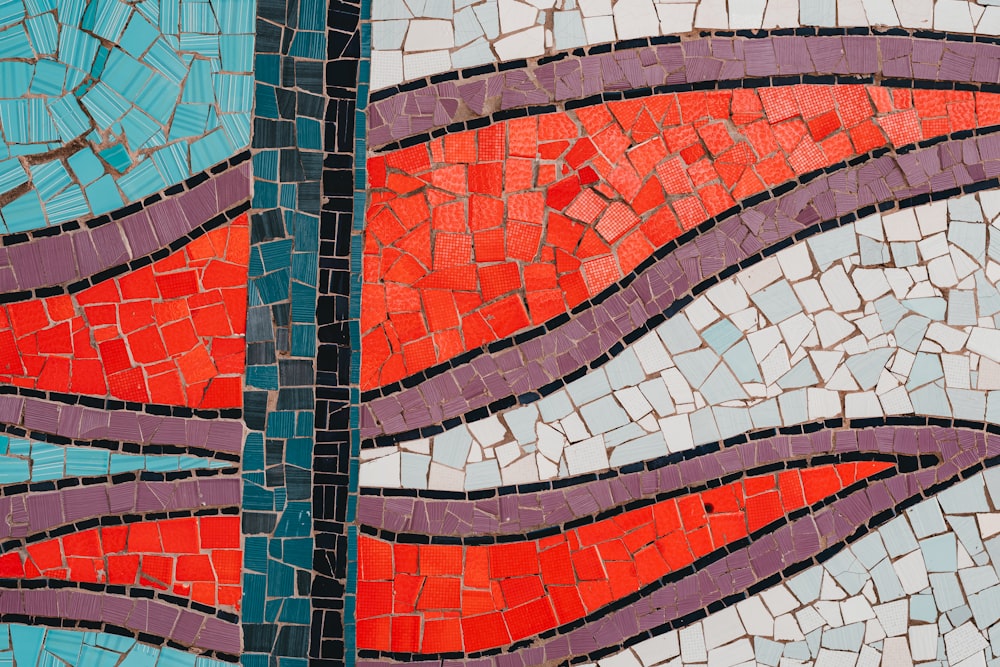 a close up of a mosaic design on a wall