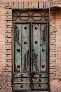 an old door with a bunch of locks on it