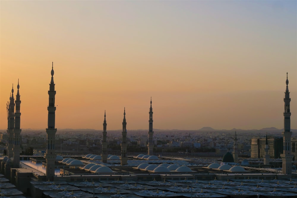 silhouette of city buildings during sunset