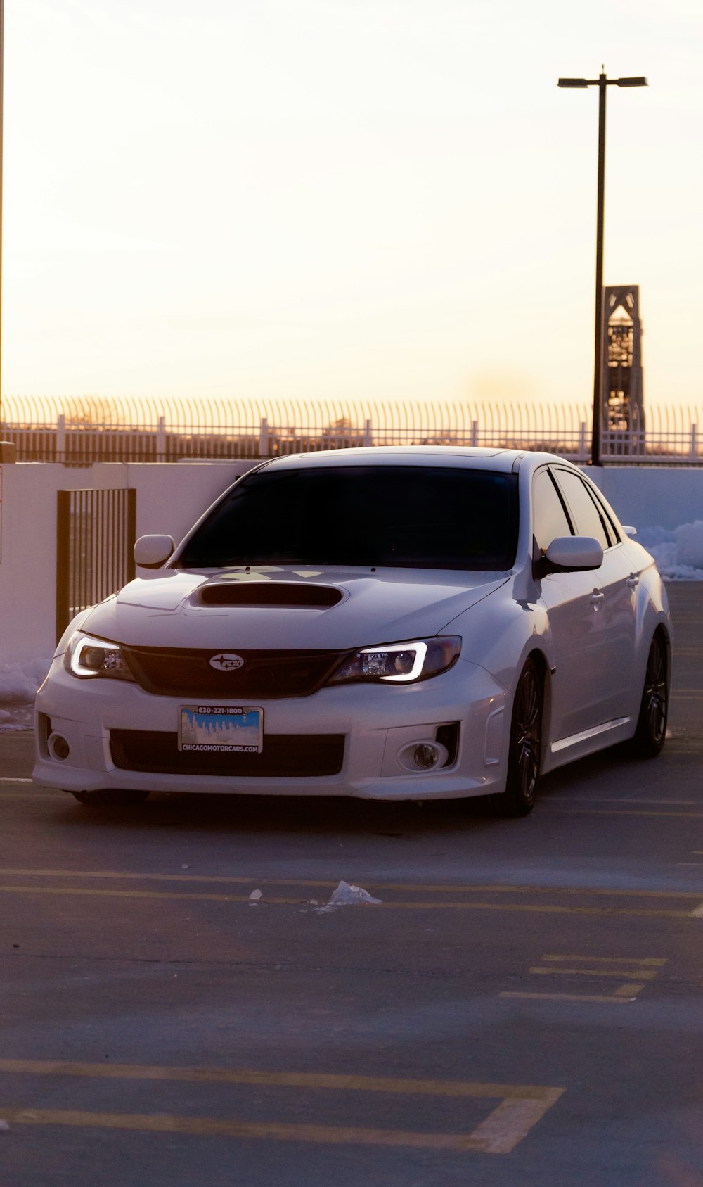 white honda car on road during daytime