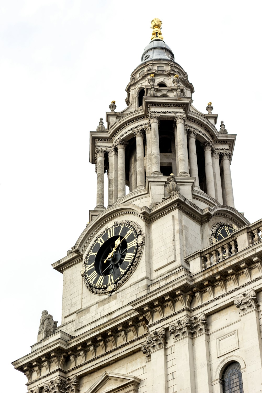 white concrete building with clock