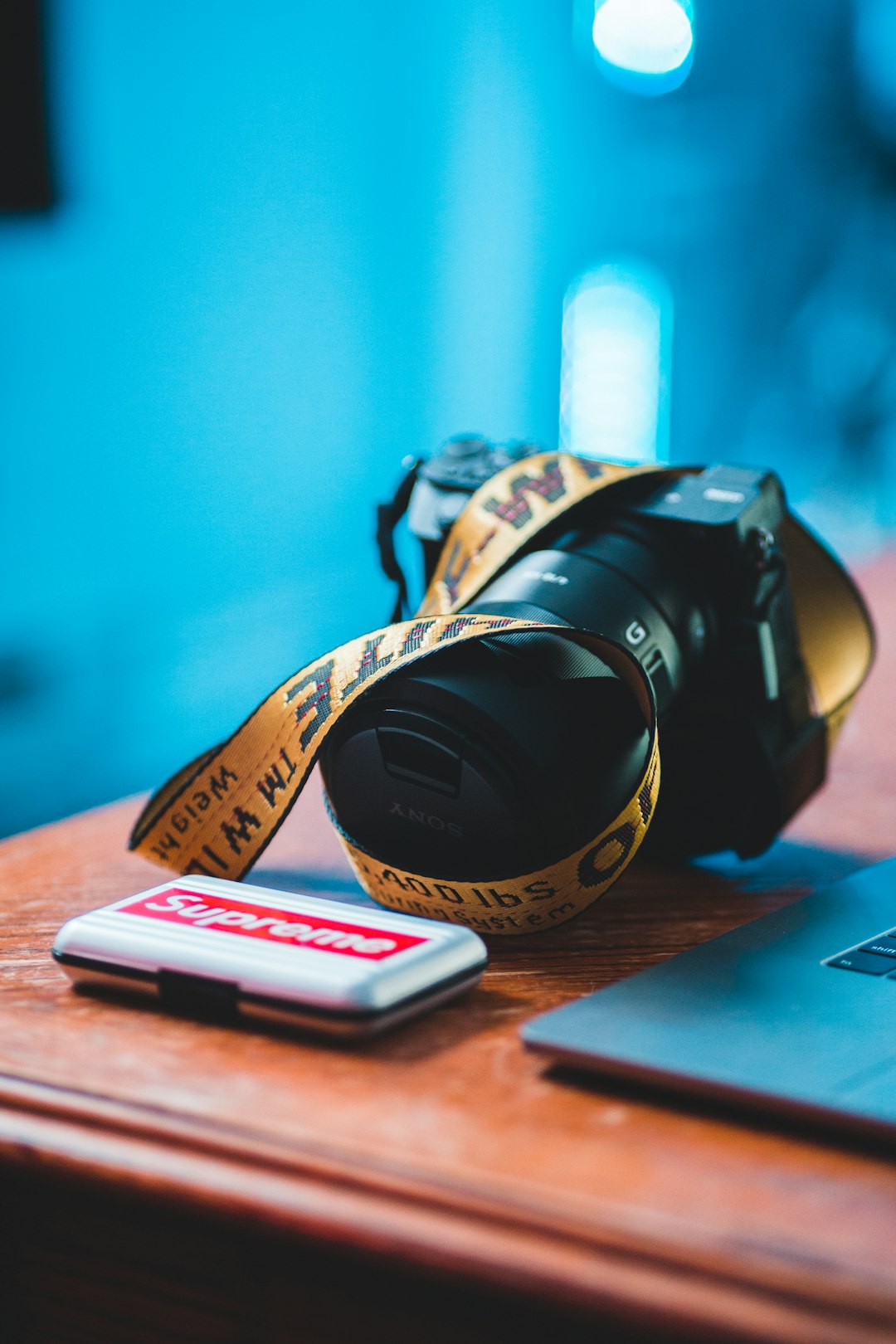 black nikon dslr camera on brown wooden table