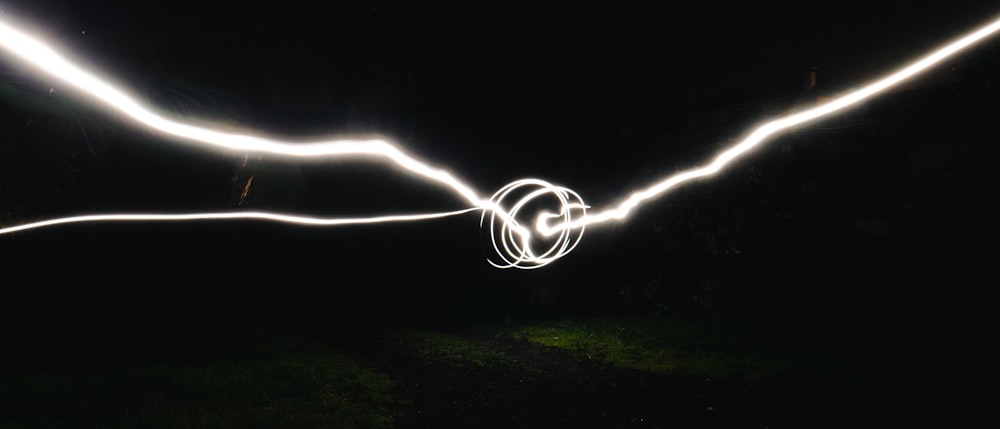 a blurry photo of a light trail in the dark