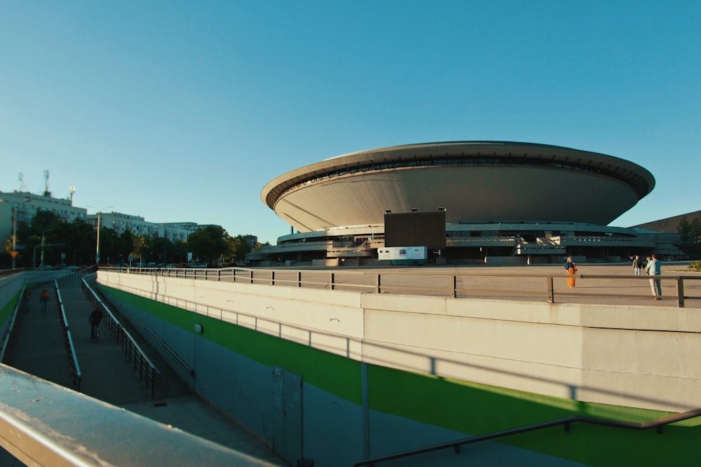 green and white stadium under blue sky during daytime