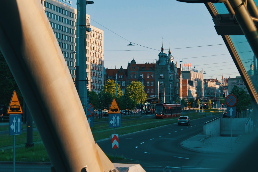 a view of a city street from inside a vehicle