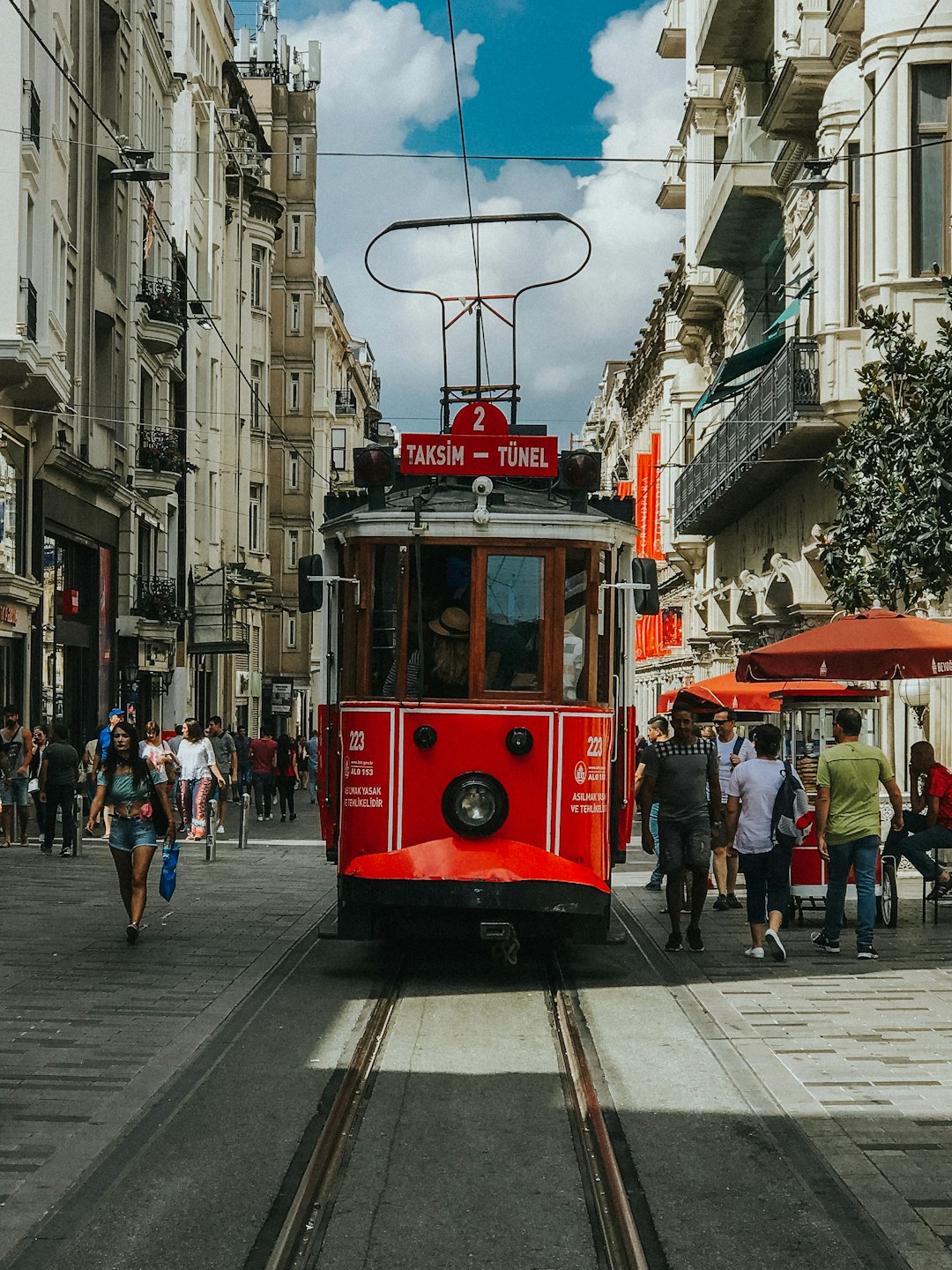  red tram on the street during daytime turkey