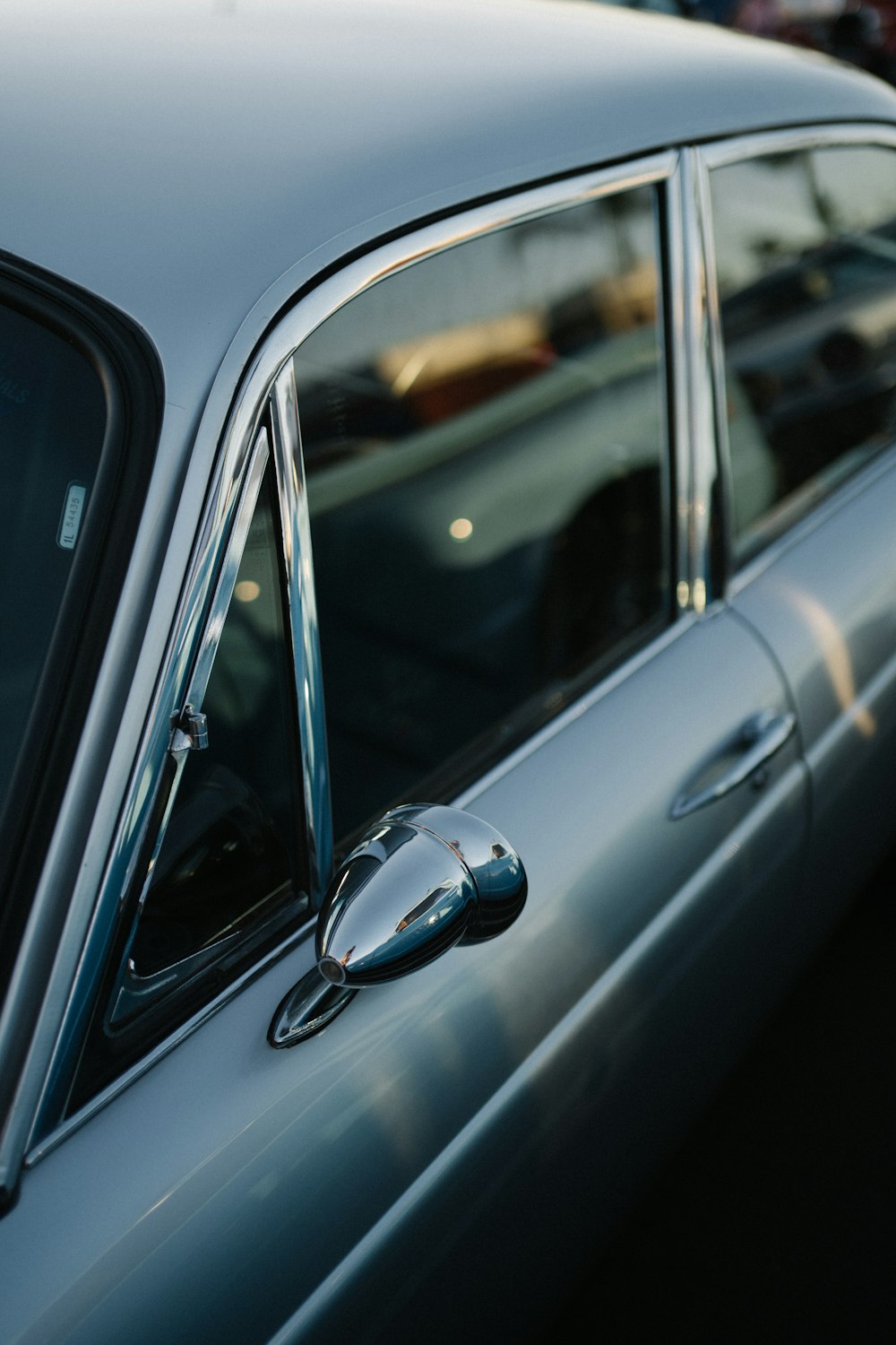 grey car with open door