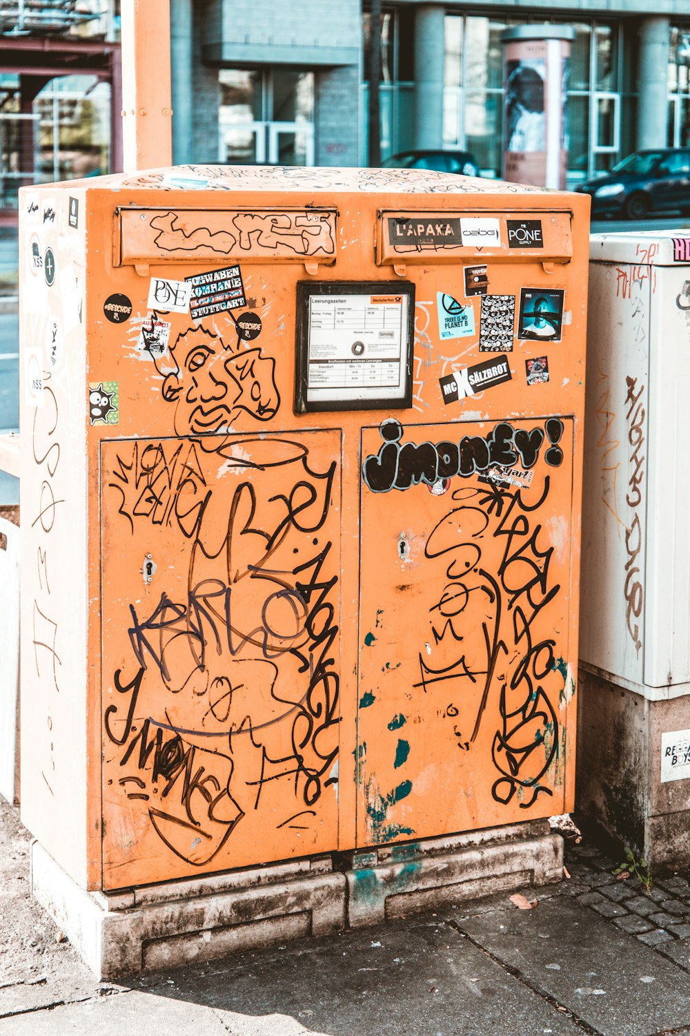 orange and white wooden cabinet