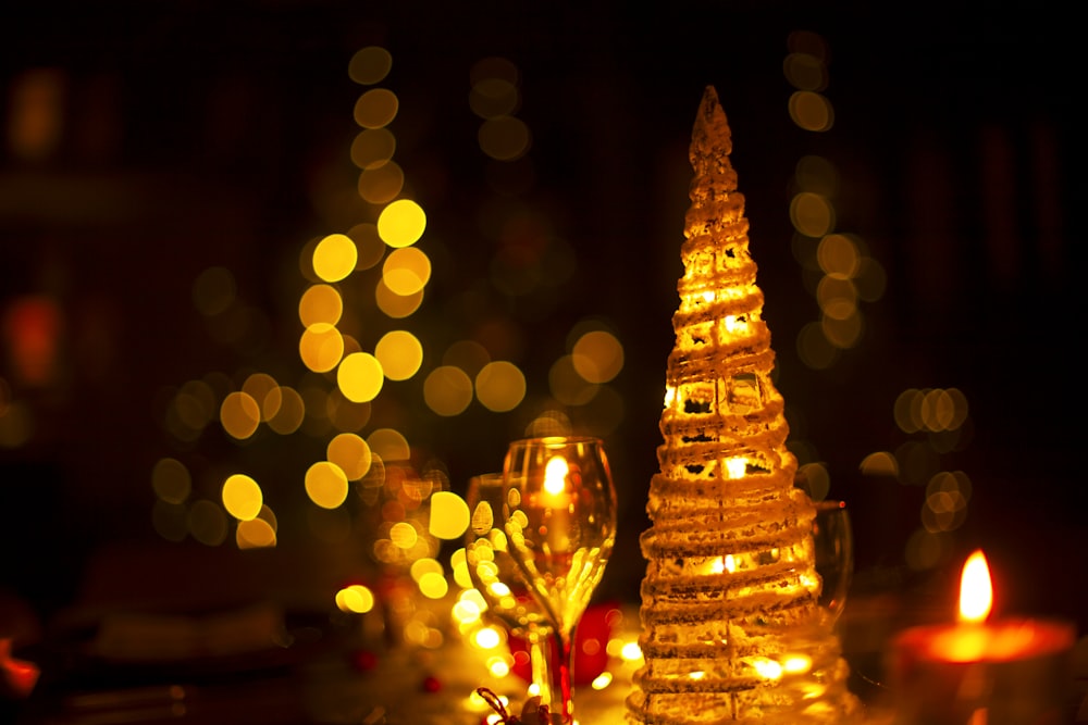 yellow lighted christmas tree during night time