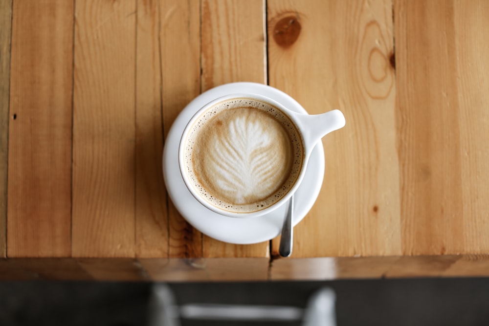 white ceramic mug with coffee