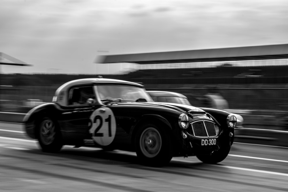 grayscale photo of black and white porsche 911