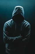 person in black hoodie jacket