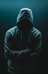 person in black hoodie jacket
