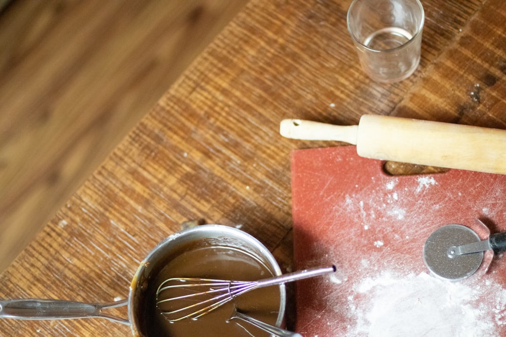 stainless steel fork on clear glass plate