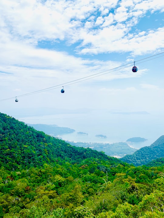 cable cars over green mountains during daytime in Langkawi Sky Bridge Malaysia