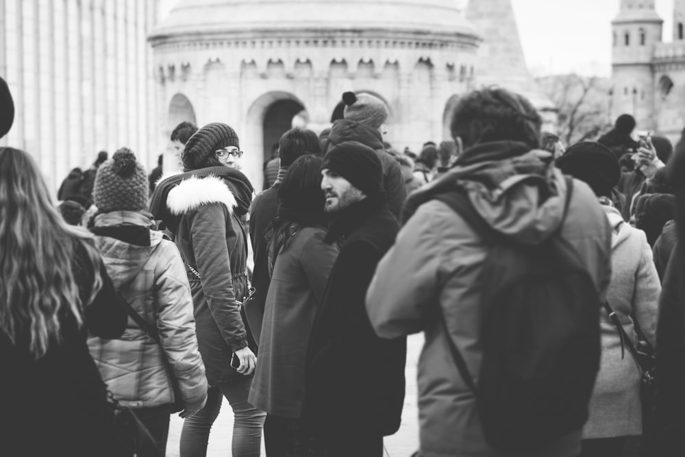 grayscale photo of people walking on street