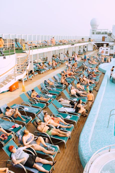 Happy family enjoying activities on a sunny cruise deck.