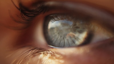 persons eye in close up photography surreal zoom background