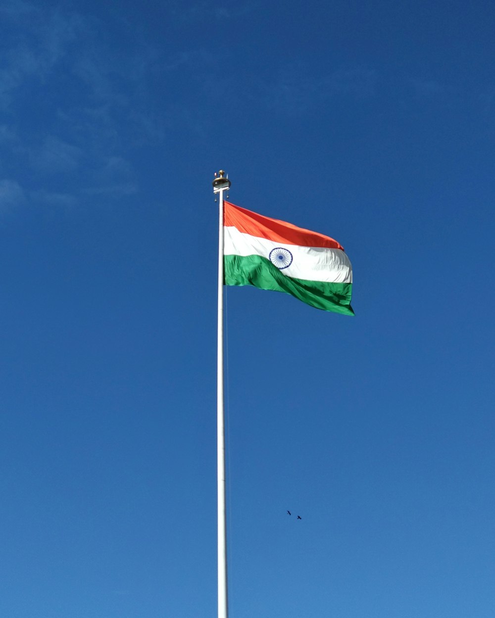 red white and green flag under blue sky during daytime