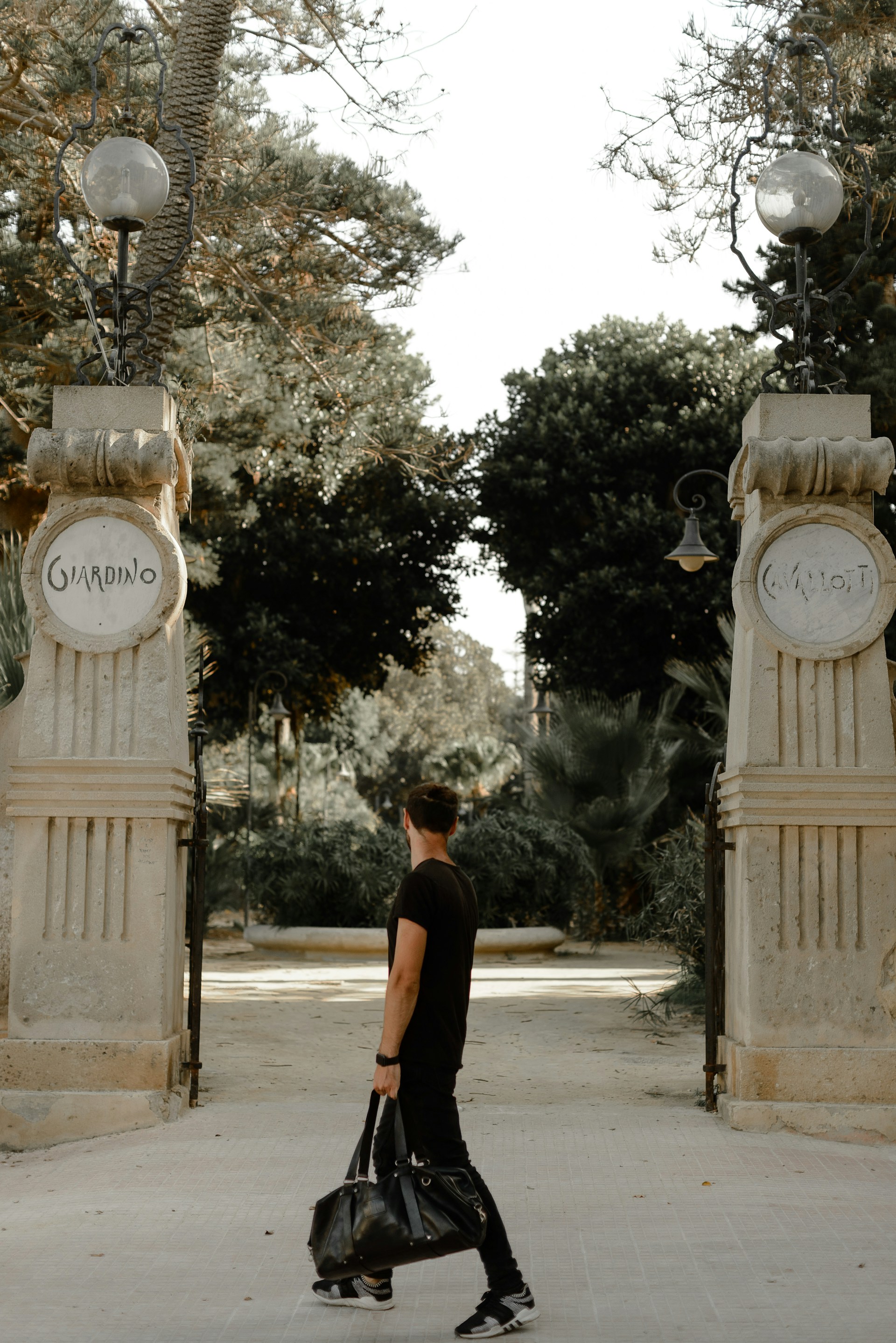 black and brown leather padded tub sofa