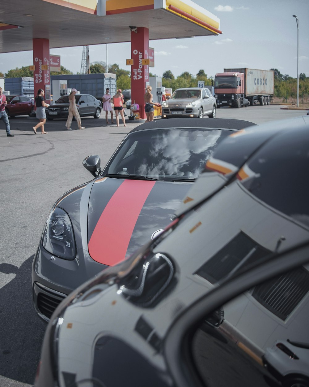 cars parked on parking lot during daytime