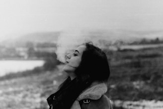 A serene image of a person enjoying nature, symbolizing freedom from smoking.