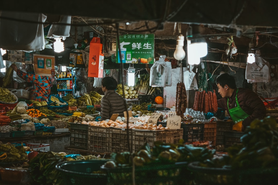 people in market during daytime