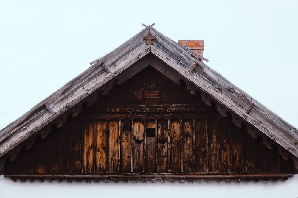 brown wooden house under white sky during daytime