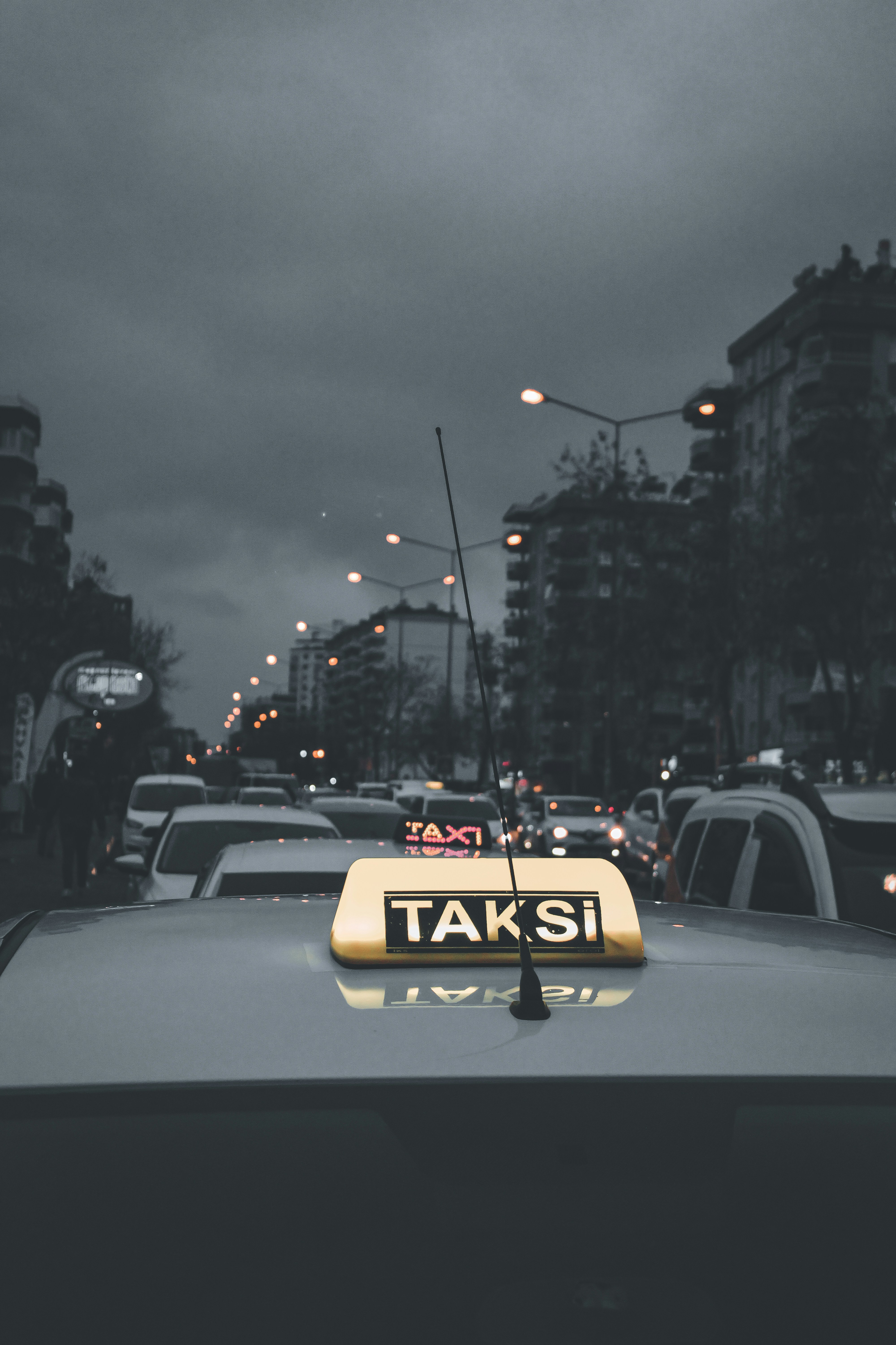white car on road during night time