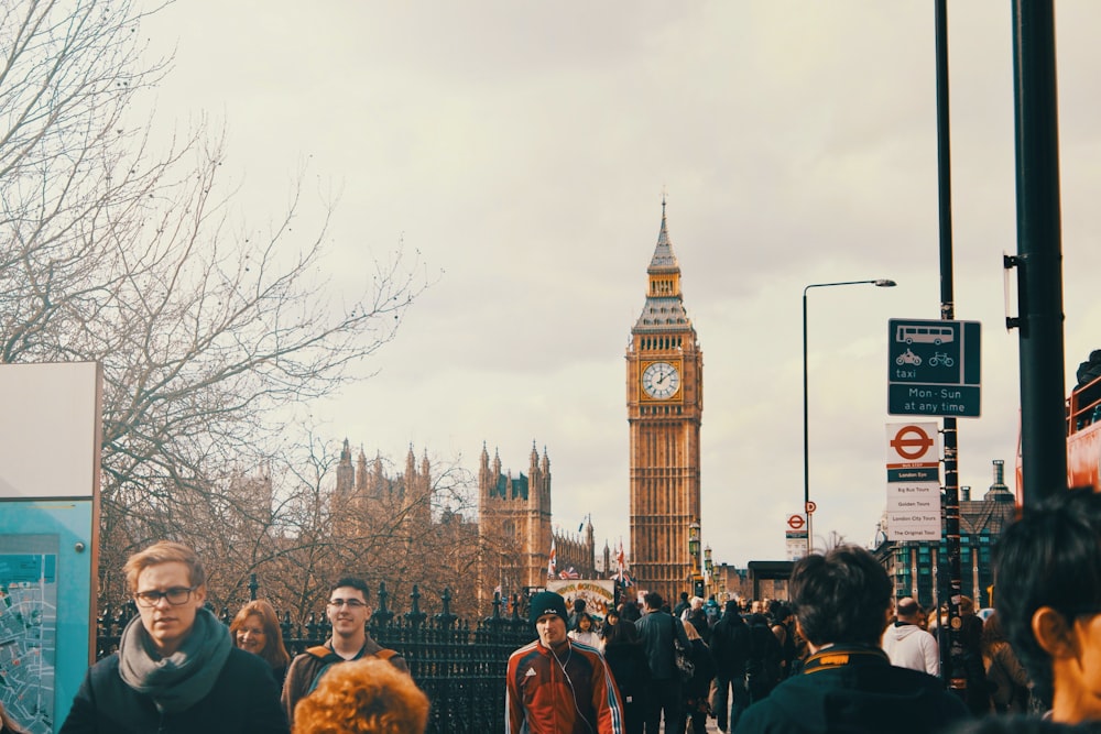 people walking on street near big ben during daytime