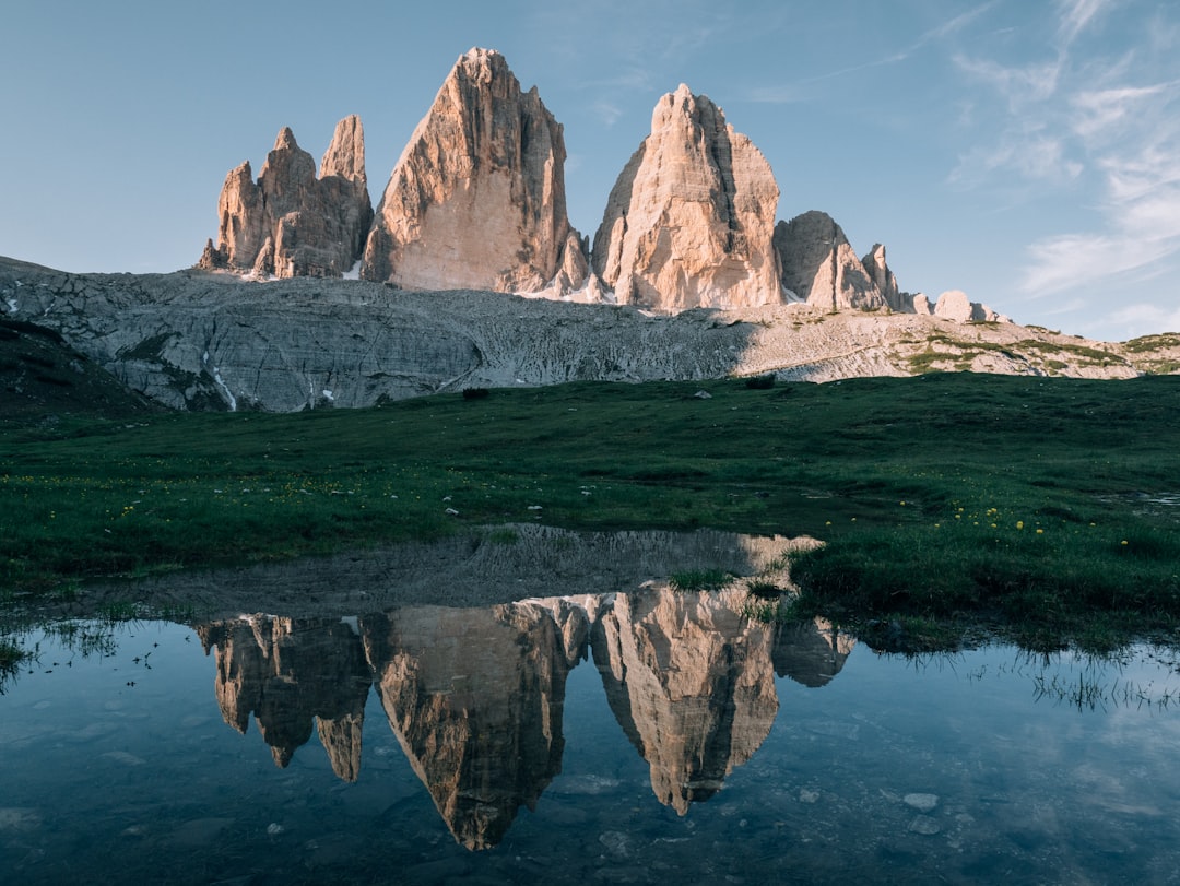 gray rocky mountain near green grass field during daytime, Tre Cime di Lavaredo, Dolomites, Italy<p></figure>The Morning ⛰</p><p>