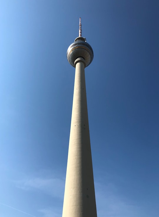 white and brown tower under blue sky during daytime in Lustgarten Germany