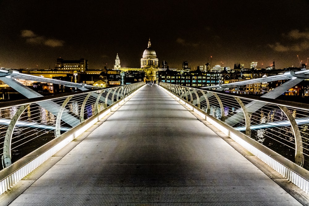 gray metal bridge during night time